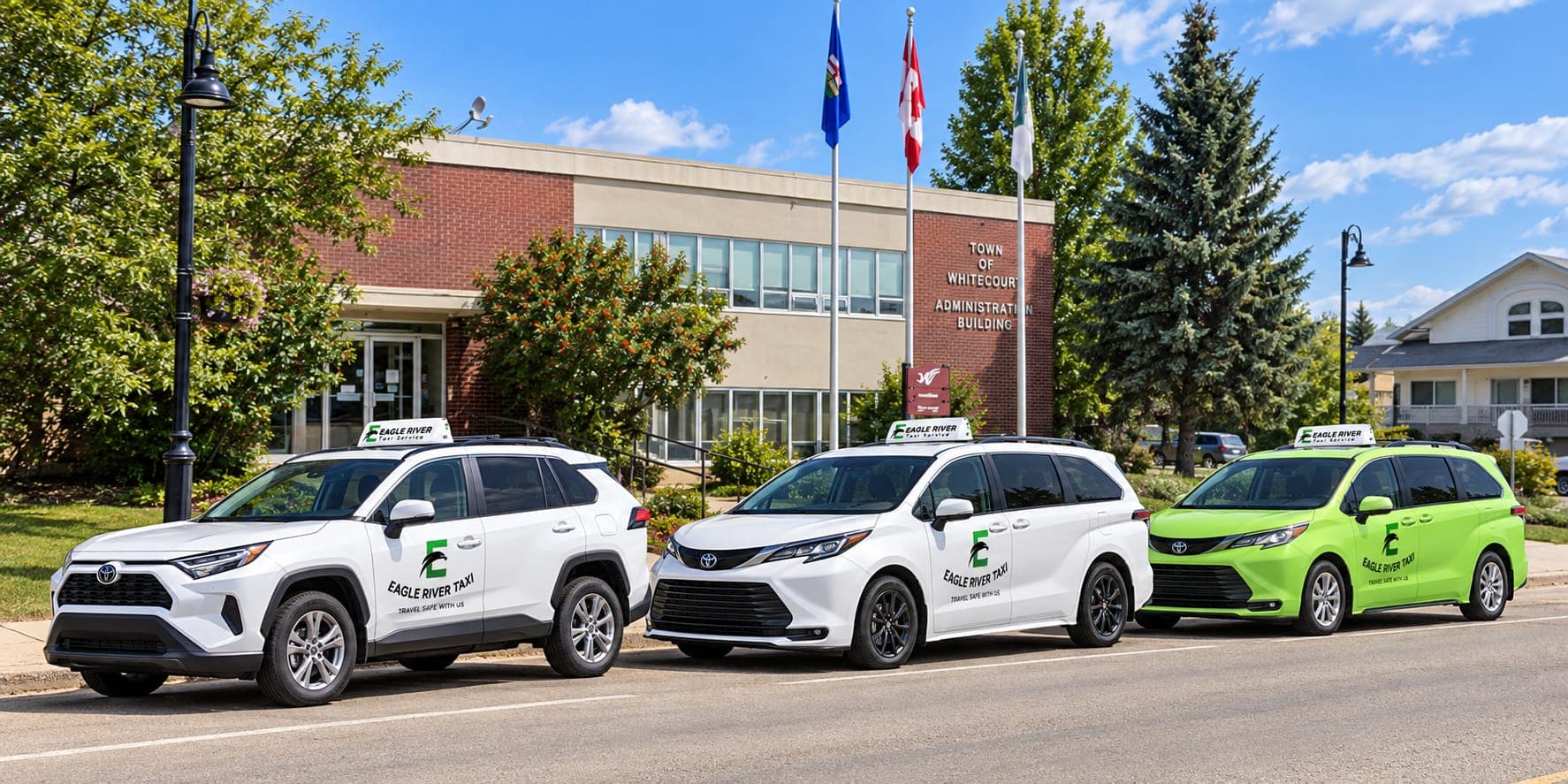 White and green Eagle River Taxi vehicles in Whitecourt.