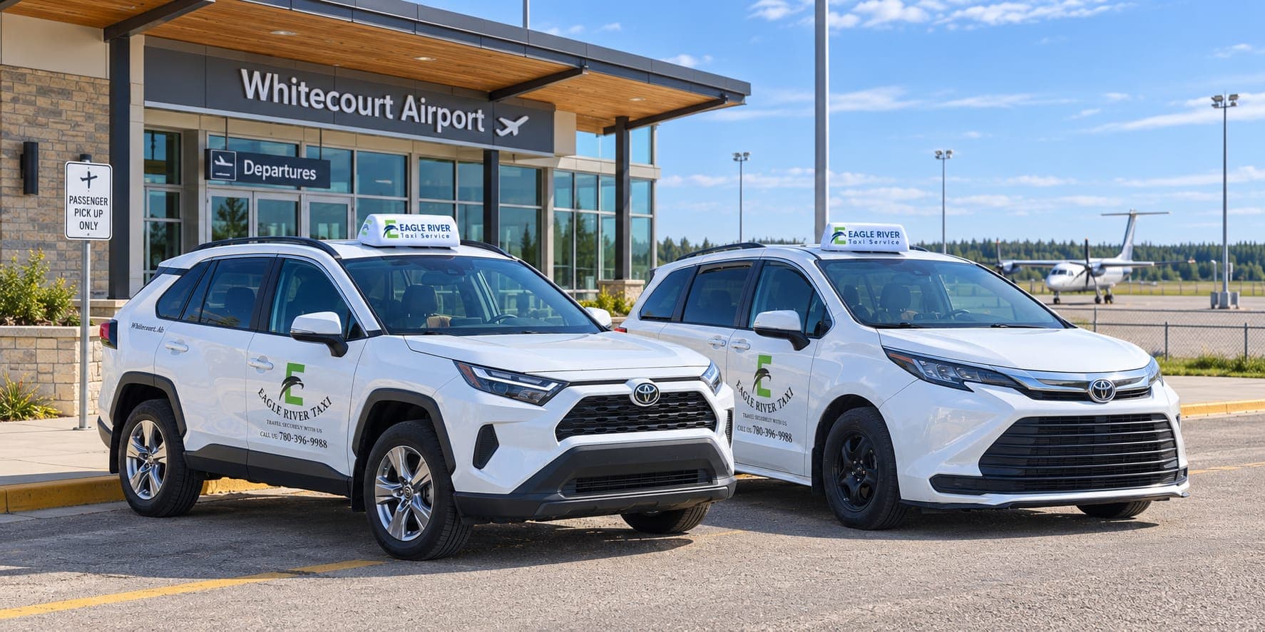 Two branded Eagle River Taxi vehicles outside Whitecourt Airport.